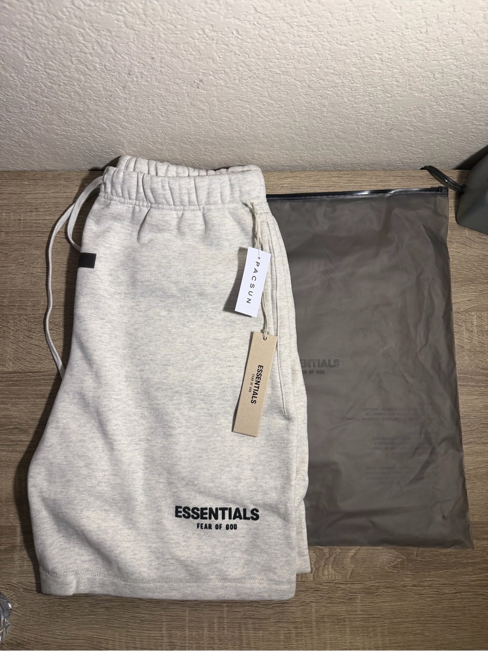 Fear of God ESSENTIALS Men's Cream Gray Sweatpants with Black Logo